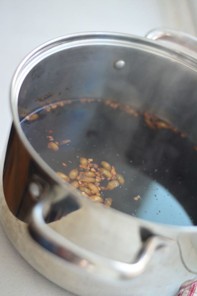 easy chai concentrate steaming in pan