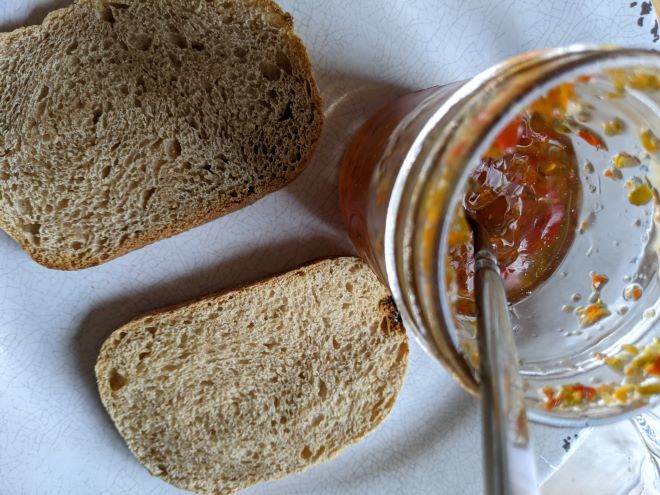 sourdough bread toast made with fresh milled flour and a jar of jam