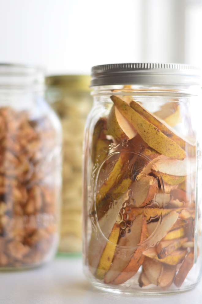 sliced unpeeled pears freeze dried and stored in a mason jar