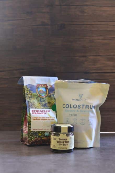Ingredients to make a vanilla colostrum latte: coffee in a bag, vanilla bean paste and vanilla wondercow brand colostrum