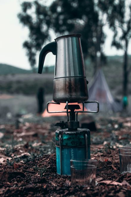 moka pot on a camp burner making espresso, how to make espresso with a moka pot