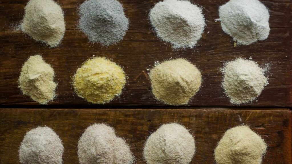 fresh milled flour: what is it? piles of fresh milled flour, fresh milled corn, buckwheat, wheat berries
